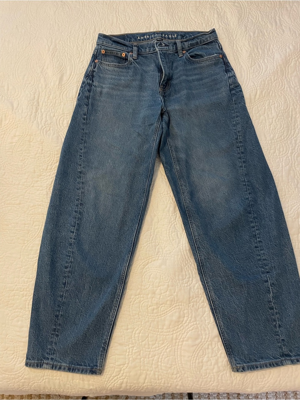 American Eagle mid rise barrel leg jeans.